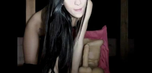 Skinny camgirl rides dildo on webcam
